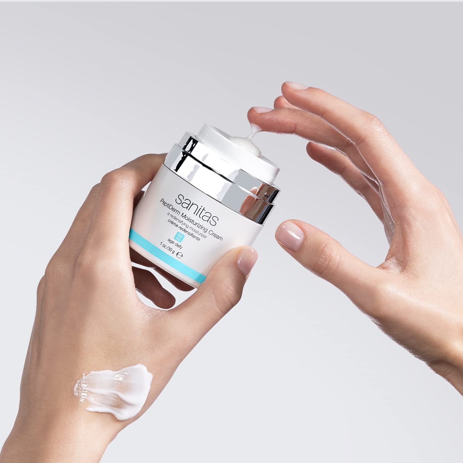 Peptide-infused anti-aging moisturizing cream for mature skin in clinical packaging — detail