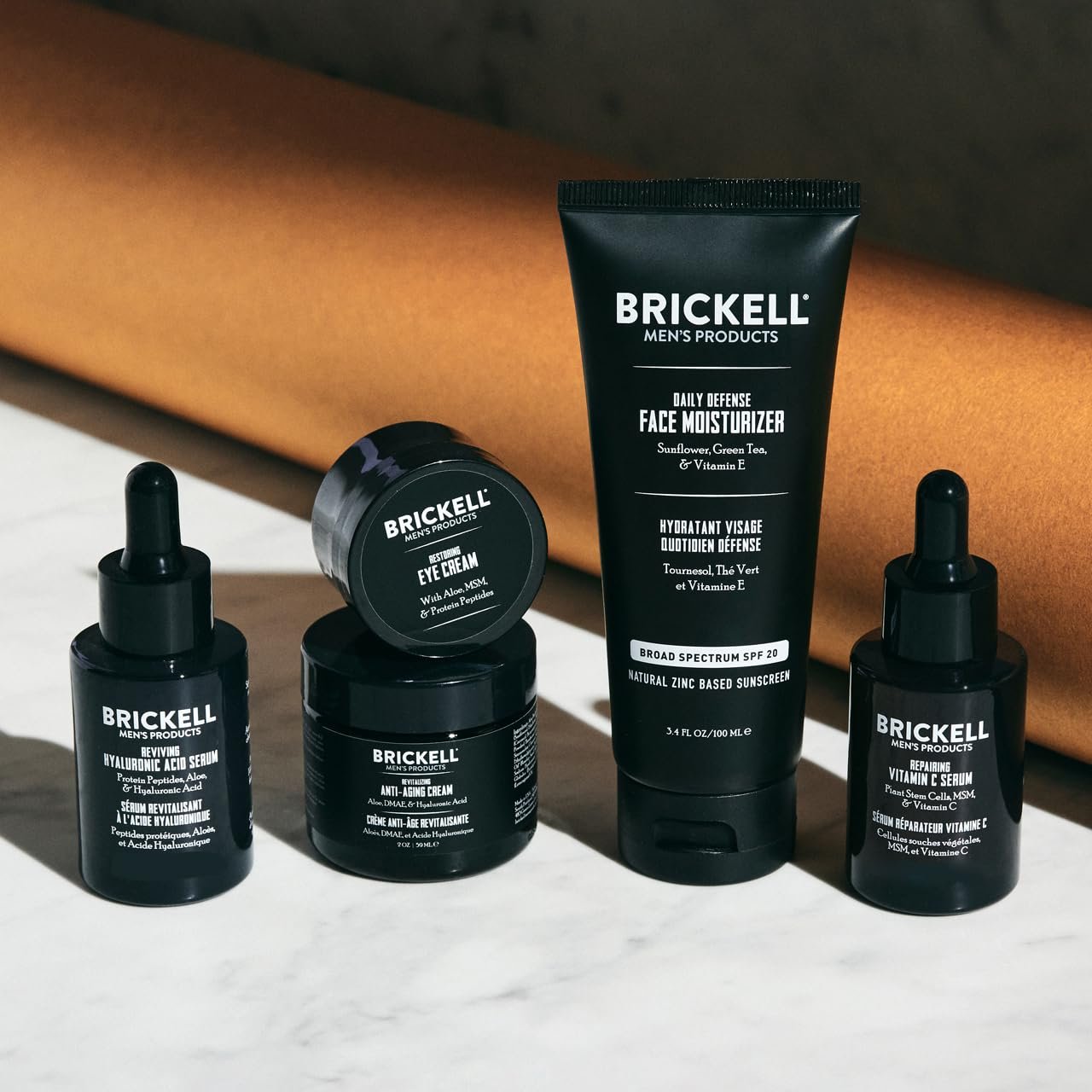 Vitamin C anti-aging skincare routine set for men including serum, moisturizer with SPF, night cream and eye cream — back