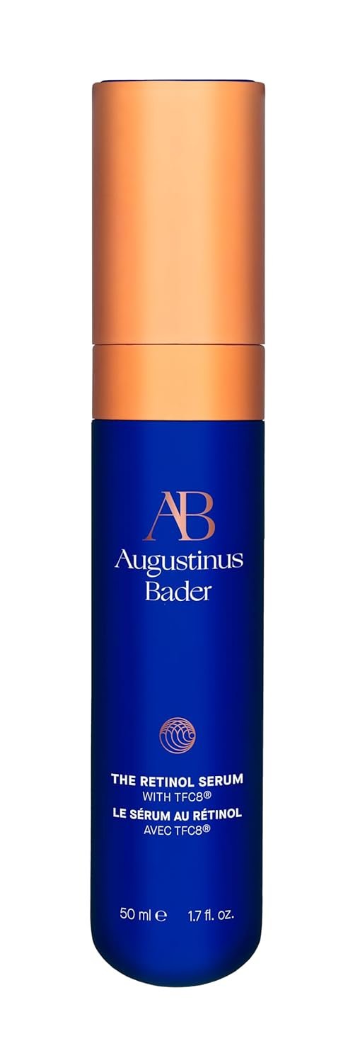 Retinol anti-aging serum bottle with dropper on neutral background, showing hydrating formula for fine lines and firmness — front